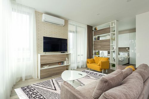 nuLOOM Cassia Moroccan Diamond Shaggy Tassel Area Rug, 8x10, Off-white in Light Modern Living Room with TV