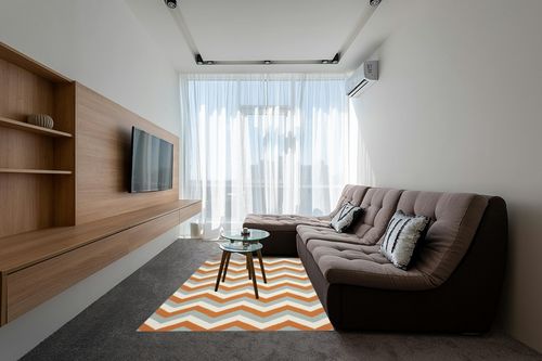 Safavieh 5' x 8' Dhurries Dhu640c Terracotta / Blue Rug in Grey Living Room with Brown Couch