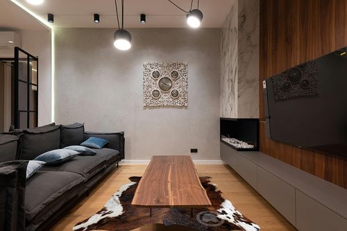 Sunshine Cowhides Genuine Dark Brindle Tricolor Cowhide Rug - Luxurious Cow Rug for Bedroom, Living Room, and Home Decor Enthusiasts - Masterpiece of Style and Functionality - 6x6-7ft (180x210cm) in Dark Wood Living Room with Black Couch