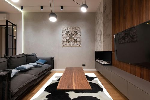 rodeo Classic Black and White Cowhide Rug … in Dark Wood Living Room with Black Couch