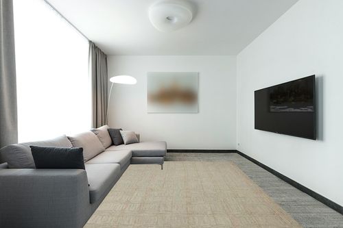 Loloi Chris Loves Julia x Polly Fog/Wheat 7'-9" x 9'-9" Area Rug in Modern Living Room with Grey Couch