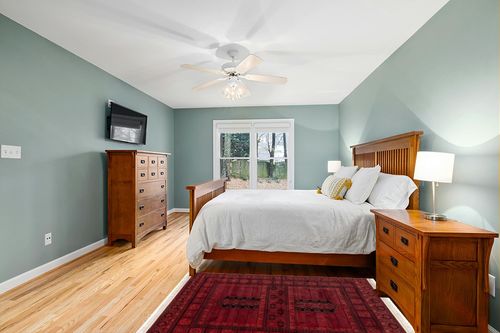nuLOOM Billie Traditional Paneled Fringe Area Rug, 4' x 6', Red in Teal and Orange Wood Bedroom
