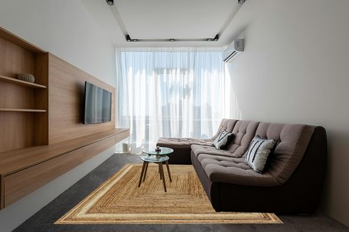 Flash Furniture Prima Natural Fiber Jute Area Rug 8' x 10' - Braided Indoor Jute Rug - Natural Area Rugs in Grey Living Room with Brown Couch
