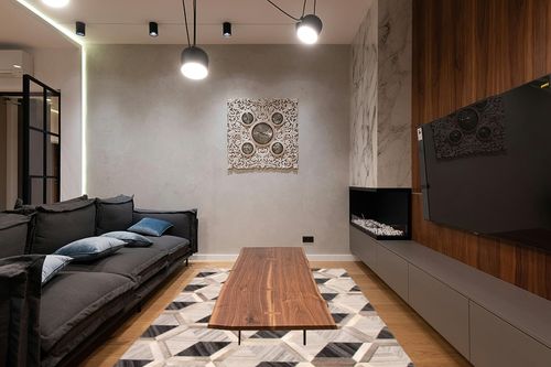 eCarpet Gallery Hand-Knotted | Area Rug for Living Room, Bedroom | Cowhide Patchwork Accent Grey Rug 5'6" x 7'7" | 350680 in Dark Wood Living Room with Black Couch