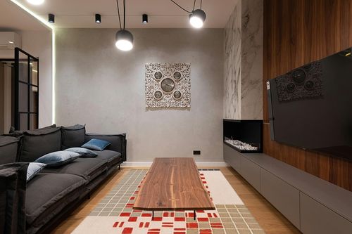 SAFAVIEH Genre Collection Area Rug - 6' x 9', Grey & Red, Handmade Wool, Ideal for Living Room, Bedroom, Dining (GRE206F-6) in Dark Wood Living Room with Black Couch