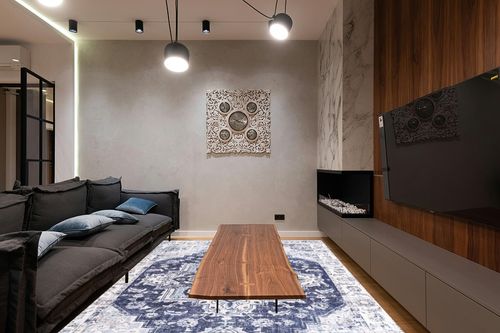 Auemtyn Washable Rug,8x10 Area Rug for Living Room, Rug with Anti-Slip Backing, Vintage Rug for Bedroom,Ultra-Thin Boho Farmhouse Rug for Home Decor(8'x10',Blue) in Dark Wood Living Room with Black Couch