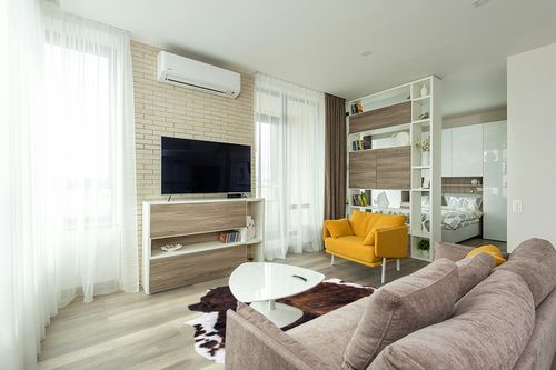 rodeo Classic Brown Brindle Cowhide Rug XXL 6x8 Ft in Light Modern Living Room with TV