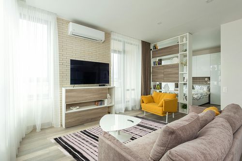 Safavieh Striped Kilim Collection Area Rug - 5' x 8', Beige & Black, Flat Weave Boho Tassel Fringe Cotton Design, Easy Care, Ideal for High Traffic Areas in Living Room, Bedroom (STK206B) in Light Modern Living Room with TV