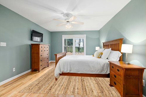 nuLOOM Rigo Hand Woven Farmhouse Jute Area Rug, 9' x 12', Natural in Teal and Orange Wood Bedroom