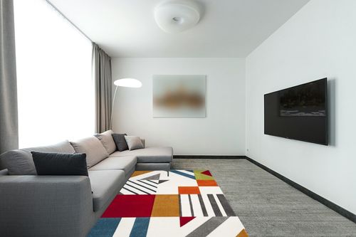 SAFAVIEH Hollywood Collection Area Rug - 5'3" x 7'6", Ivory & Peacock Blue, Mid-Century Modern Design, Non-Shedding & Easy Care, Ideal for High Traffic Areas in Living Room, Bedroom (HLW709B) in Modern Living Room with Grey Couch