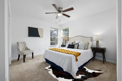 Cowhides Direct Genuine Cowhide Rug - Tricolor Cow Fur Rugs for Living Room, Bedroom & More - Authentic Cow Rug (6’x6’ Tricolor) in White and Yellow Modern Bedroom