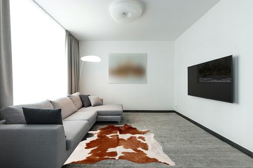 Brown and White Cowhide Rug Natural Cow Skin Cow Hide Leather Area Rug Hair On, 5 ft X 6 ft Premium Brown White Large in Modern Living Room with Grey Couch