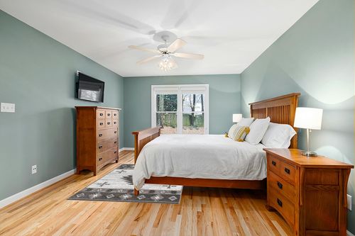 Well Woven Southwestern Rodrigo 5'3" x 7'3" Grey Area Rug in Teal and Orange Wood Bedroom