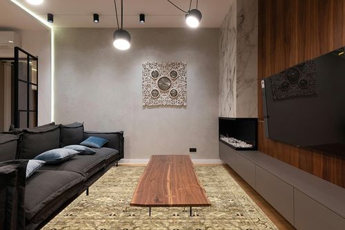 Loloi II Margot Collection MAT-04 Antique / Green 7'-6" x 9'-6", 3.8" Thick, Area Rug, feat.CloudPile, Soft, Durable, Printed, Medallion, Low Pile, Non-Shedding, Easy Clean, Living Room Rug in Dark Wood Living Room with Black Couch