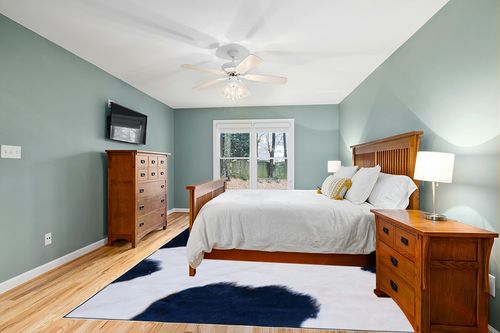 Safavieh Faux Hide Collection Area Rug - 9' x 12', Ivory & Dark Blue, Tiger Print Design, Non-Shedding & Easy Care, Machine Washable Ideal for High Traffic Areas in Living Room, Bedroom (FAH548A) in Teal and Orange Wood Bedroom