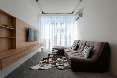Appaloosa Cowhides Natural Cowhide Rug - Tricolor Cowhide Area Rug for Bedroom & Living Room - Luxury Cowhides Modern Accent Rug - Genuine Leather with Real Animal Fur, Original, 6 x 7 Feet in Grey Living Room with Brown Couch