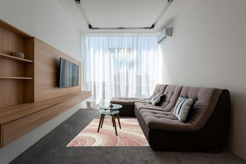 Koo Geometric Pink Area Rug Orren Ellis Rug Size: Rectangle 5' x 7' in Grey Living Room with Brown Couch