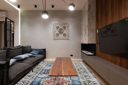 COZYLOOM Boho Area Rug 8x10 Distressed Rug Oriental Floral Soft Plush Indoor Carpet for Living Room Bedroom Aesthetic Accent Rug Cozy & Fluffy Faux Wool Rug Non-Slip Non-Shedding Blue in Dark Wood Living Room with Black Couch