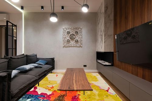 Unique Loom Estrella Collection, Abstract, Bright Colors, Modern Area Rug, Rectangular 9' 0" x 12' 0", Beige/Yellow in Dark Wood Living Room with Black Couch