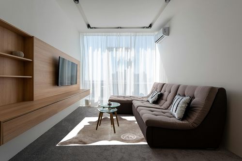 Sunshine Cowhides Genuine Taupe Cowhide Rug - Luxurious Cow Rug for Bedroom, Living Room, and Home Decor Enthusiasts - Masterpiece of Style and Functionality - 6x6-7ft (180x210cm) in Grey Living Room with Brown Couch