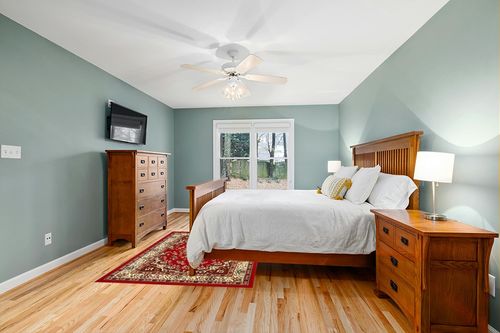 Antep Rugs Kashan King Collection Himalayas Oriental Polypropylene Indoor Area Rug (Maroon/Beige, 5' x 7') in Teal and Orange Wood Bedroom