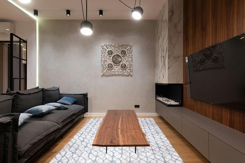 SAFAVIEH Amelia Collection Area Rug - 6' x 9', Grey & Blue, Geometric Design, Non-Shedding & Easy Care, Ideal for High Traffic Areas in Living Room, Bedroom (ALA792F) in Dark Wood Living Room with Black Couch