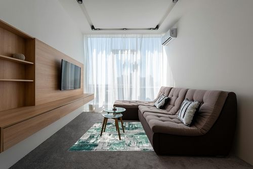 LUXE WEAVERS Abstract Distressed Green 5x7 Area Rug for Living Room in Grey Living Room with Brown Couch