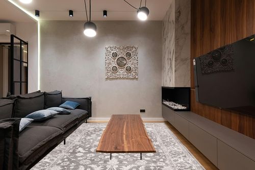SAFAVIEH Brentwood Collection Area Rug - 8' x 10', Cream & Grey, Traditional Oriental Design, Non-Shedding & Easy Care, Ideal for High Traffic Areas in Living Room, Bedroom (BNT844B) in Dark Wood Living Room with Black Couch
