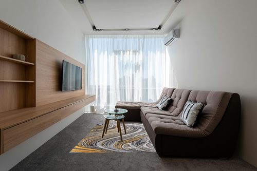 Rugshop Contemporary Abstract Swirl Stain Resistant Soft Area Rug 5' x 7' Yellow in Grey Living Room with Brown Couch