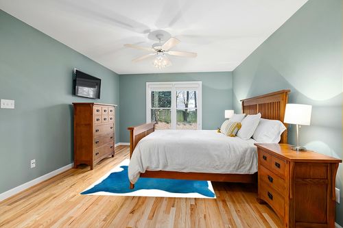 Natural Geneva Cowhide Area Rugs for Living Room and Bedroom | Handmade 100% Cow Rug with Low Pile | Shed-Resistant Home and Office Rug, Sky Blue, 6 ft x 7 ft in Teal and Orange Wood Bedroom