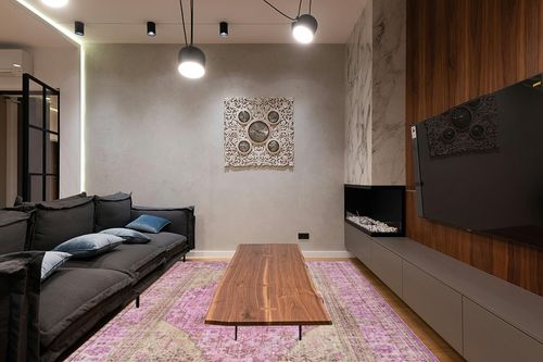 Well Woven Nile Gila Machine Washable Vintage Bohemian Medallion Oriental Pink Flat-Weave Distressed 7'7" X 9'6" Area Rug in Dark Wood Living Room with Black Couch