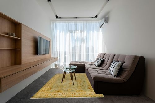 SAFAVIEH Oushak Collection Area Rug - 6' x 9', Soft Green & Ivory, Hand-Knotted Traditional Oriental Wool, Ideal for High Traffic Areas in Living Room, Bedroom (OSH141A) in Grey Living Room with Brown Couch