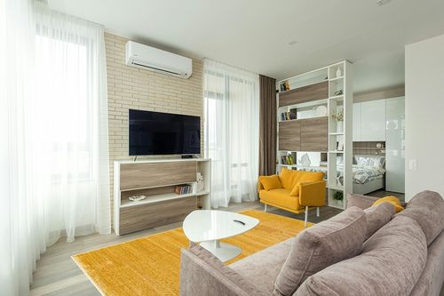 Unique Loom Finsbury Collection Area Rug - Kate (6' 1" x 9' Rectangle, Yellow) in Light Modern Living Room with TV