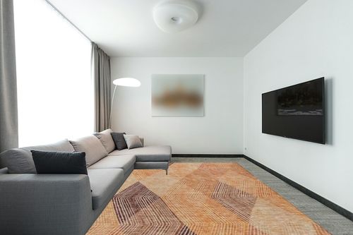 Addison Rugs Chantille ACN962 Orange 9' x 12' Indoor Outdoor Area Rug, Easy Clean, Machine Washable, Non Shedding, Bedroom, Entry, Living Room, Dining Room, Kitchen, Patio Rug in Modern Living Room with Grey Couch