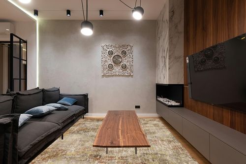 GENIMO Washable Area Rugs for Living Room Bedroom, 8x10 Modern Abstract Non Slip Rug, Low Pile Soft Contemporary Indoor Floor Carpet Cover for Dinning Room Kitchen, Orange in Dark Wood Living Room with Black Couch