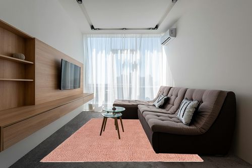 Pink Shag Rug Perfect in Grey Living Room with Brown Couch