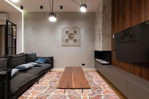 SAFAVIEH Aspen Collection Area Rug - 9' x 12', Pink & Orange, Handmade Boho Wool, Ideal for High Traffic Areas in Living Room, Bedroom (APN260U) in Dark Wood Living Room with Black Couch