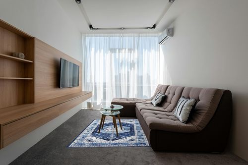 GAOMON Bohemian Washable Area Rug 5x7 Vintage Living Room Rug, Large Non-Slip Boho Bedroom Throw Mat,Blue Floral Printed Non-Shedding Carpet for Dining Room Dorm,Blue in Grey Living Room with Brown Couch