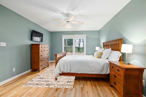 eCarpet Gallery Hand-Knotted | Area Rug for Living Room, Bedroom | Cowhide Patchwork Accent Grey Rug 5'4" x 8'6" | 350262 in Teal and Orange Wood Bedroom