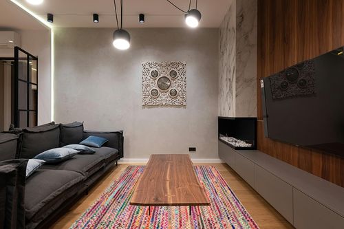 nuLOOM Aleen Bohemian Cotton/Jute Area Rug, 6x9, Multi in Dark Wood Living Room with Black Couch