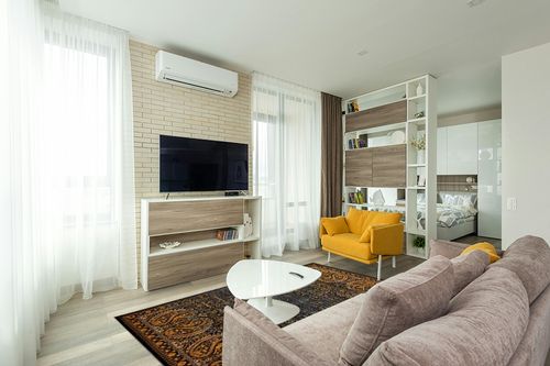 Unique Loom Imperial Collection Paisley, Distressed, Border, Vintage, Modern, Abstract Area Rug, 5 x 8 ft, Black/Orange in Light Modern Living Room with TV