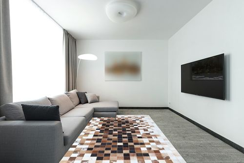 Cowhide Brown Patchwork Home Decorative Area Rug & Carpet Hand Made Cow Leather Hair (6'x9') in Modern Living Room with Grey Couch