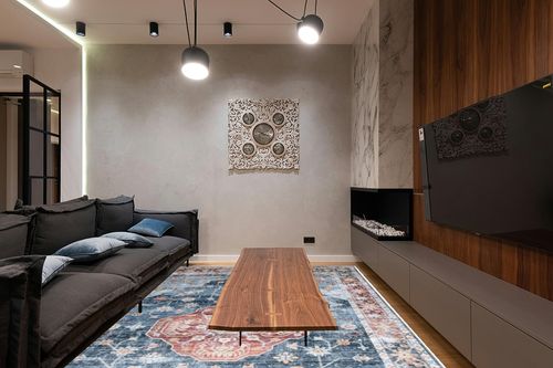 HOMBYS 9x12 Vintage Area Rug for Living Room Bedroom, Large Boho Floor Carpet with Non-Slip Backing for Indoor Office Dining Room, Traditional Home Deco Non-Shedding, Blue, Machine Washable in Dark Wood Living Room with Black Couch