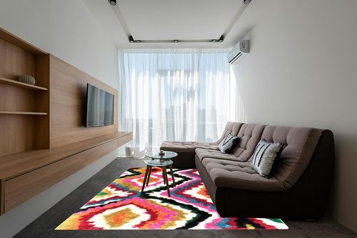 nuLOOM Handmade Carnival Abbey Shaggy Area Rug, 7' 6" x 9' 6", Multi in Grey Living Room with Brown Couch