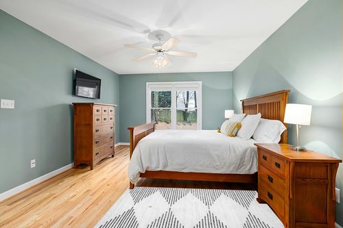 nuLOOM Romina Machine Washable Diamond Stripes Area Rug, 4x6, White in Teal and Orange Wood Bedroom