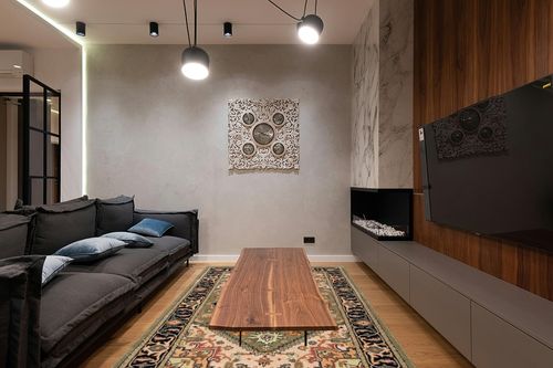 SAFAVIEH Heritage Collection Area Rug - 6' x 9', Green & Light Brown, Handmade Traditional Oriental Wool, Ideal for High Traffic Areas in Living Room, Bedroom (HG625Y) in Dark Wood Living Room with Black Couch