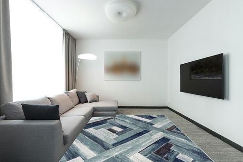 LUXE WEAVERS Modern Abstract Wood Carpet Geometric Blue 8x10 Area Rug in Modern Living Room with Grey Couch