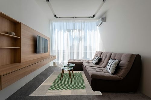 SAFAVIEH Genre Collection Area Rug - 6' x 9', Grey & Green, Handmade Wool, Ideal for Living Room, Bedroom, Dining (GRE207F-6) in Grey Living Room with Brown Couch