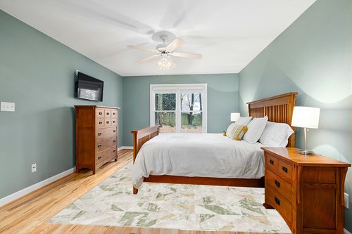 Pyburn Abstract Green Area Rug Trent Austin Design Rug Size: Rectangle 9' x 12' in Teal and Orange Wood Bedroom