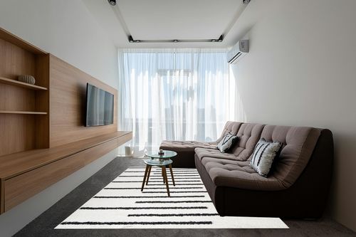 JONATHAN Y MOH402A-8 Alaro Berber Stripe Shag Indoor Area-Rug Bohemian Geometric Contemporary Glam Easy-Cleaning Bedroom Kitchen Living Room Non Shedding, 8 X 10, White/Black in Grey Living Room with Brown Couch